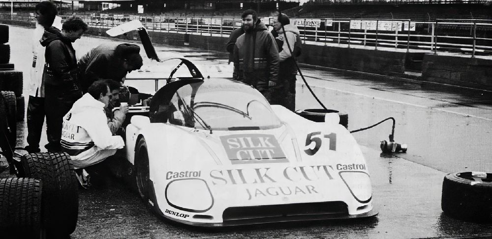 XJR-6 in wet Silverstone pits during winter testing
