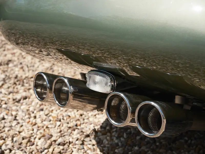 Rear bumper with quad exhaust tips