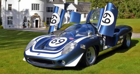 The Ecurie Ecosse LM69 with its gull-wing doors open