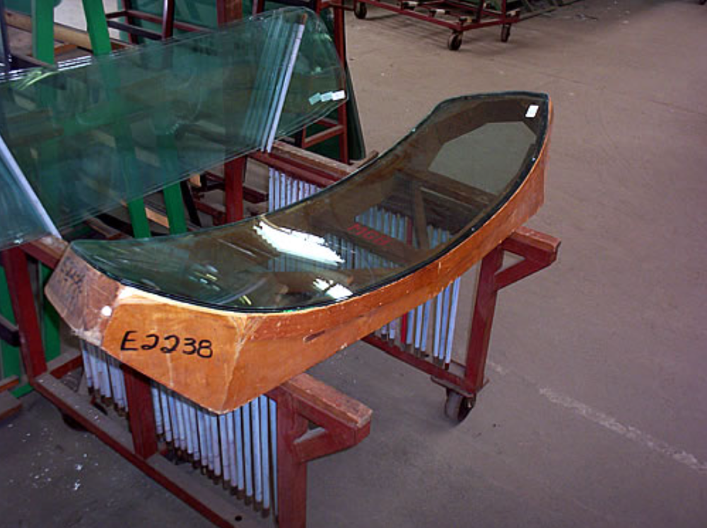Jaguar XJ13 Batch of completed MGB windscreens showing how the fitment gauge is used.