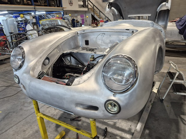 Bare body shell with the engine bay opened up